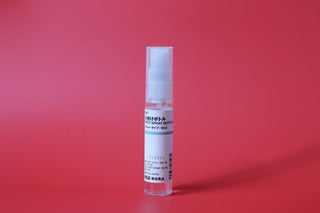 white and pink labeled bottle