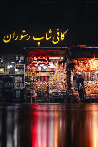 a store front with a lot of food on display