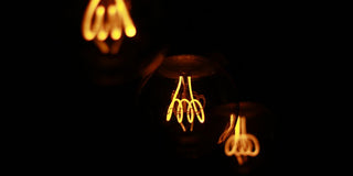 three incandescent light bulbs