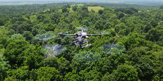 Drone with LiDAR technology over a green landscape.