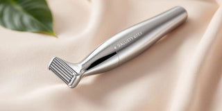 Close-up of a sleek nose hair shaver.