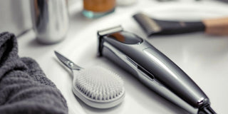 Nose and hair clipper on a bathroom countertop.