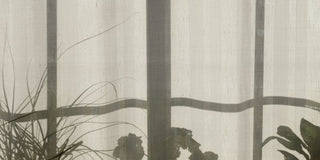 gray and white floral curtain