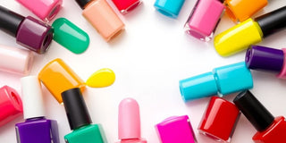 Colorful gel nail polish bottles on a white background.