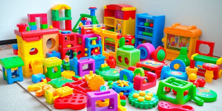 Colorful educational toys on a soft play mat.